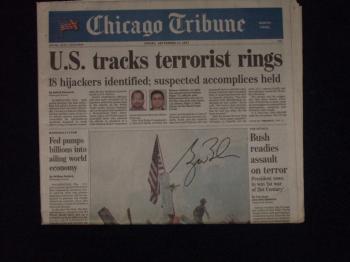 Image of George W. Bush autographed "911" themed 2001 full newspaper