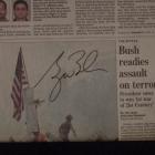 Image of George W. Bush autographed "911" themed 2001 full newspaper